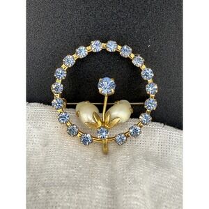 Vintage Blue Rhinestone Flower Brooch Gold Tone Made in Austria